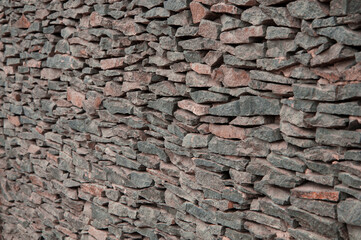 stone background. creative gray texture. colored mosaic. wall made of slabs	