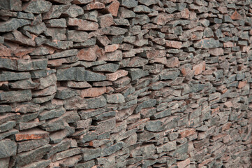 stone background. creative gray texture. colored mosaic. wall made of slabs