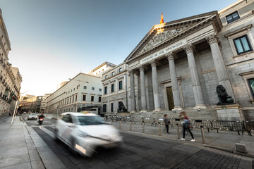 Spanish parliament (Congreso de los diputados) famous facade with two lions sculptures at each...
