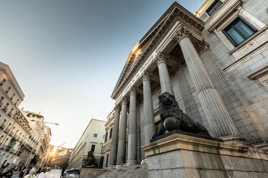 Spanish parliament (Congreso de los diputados) famous facade with two lions sculptures at each side; Madrid, Spain.