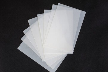 Minimalist composition with white plastic sheets. Rectangular te