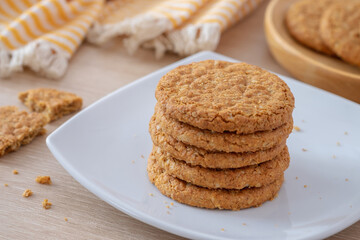 Fototapeta na wymiar Oatmeal cookies on white plate