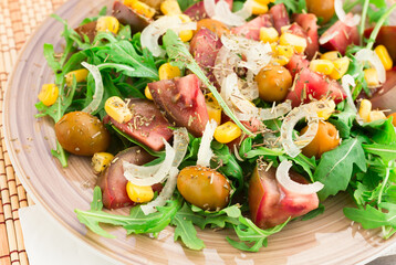 fresh vegetarian healthy vegetable salad with arugula