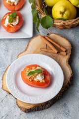 Traditional Turkish style quince dessert. The quince is cooked until soft, sherbet is poured on it, and served with cream and walnuts. It is one of the most popular Turkish desserts.(Ayva Tatlisi)