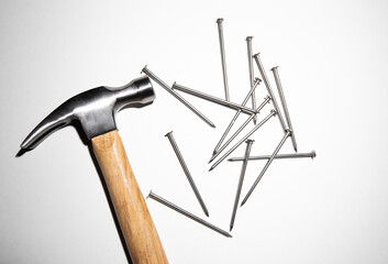 hammer and nails on white background