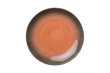 Orange ceramic round plate isolated over white background. Top view