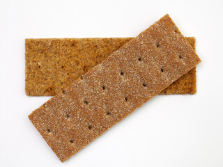 Thin rye crisp bread isolated on white background. Flat lay.