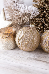 Fototapeta na wymiar Golden christmas balls with bokeh background.