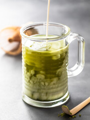 
Matcha green tea with milk.
