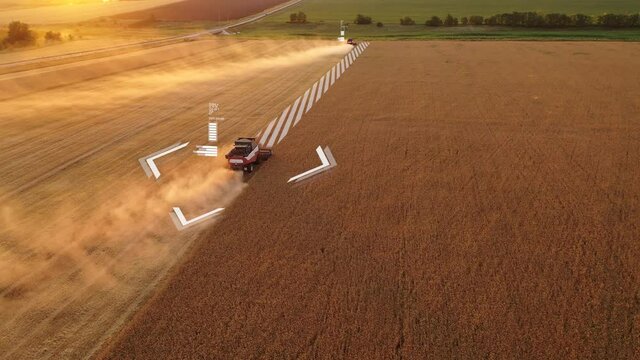Aerial view of autonomous harvester on the field.  Digital transformation in agriculture