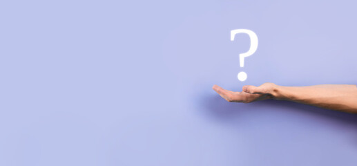 Businessman man hand hold interface question marks sign web. Ask quiestion online, FAQ concept, what where when how and why, search information on internet