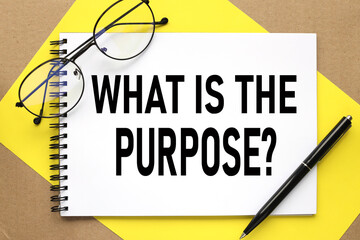 what is the purpose ? text on notepad on bright stiff backing and craft background