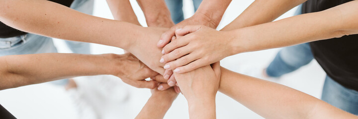 Top view of women's hands put together