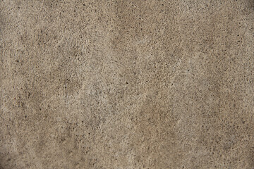 Close-up of a solid wall with uneven recesses