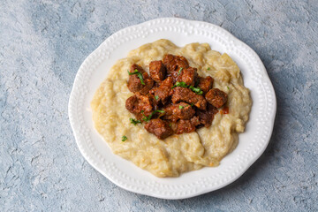 Turkish Food Hunkar Begendi made with Eggplant and Meat.
