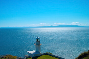 Fototapeta na wymiar 灯台と海の風景