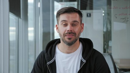 Confident adult businessman freelancer look at webcam laptop conference video calling in office, happy entrepreneur talking doing online video chat job interview sit at desk in office, web camera view