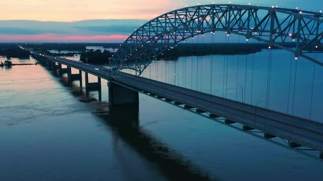 Aerial Hyperlapse of bridge over the Mississippi River at night. Memphis, Tennessee, USA