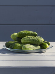 Harvest of cucumbers. Healthy diet. Vegetables on a plate.