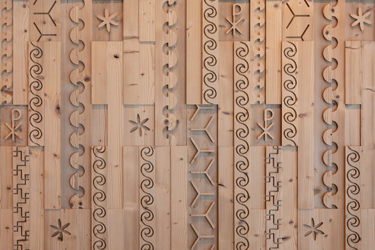 various decorative milled patterns in pine wood as a wall design