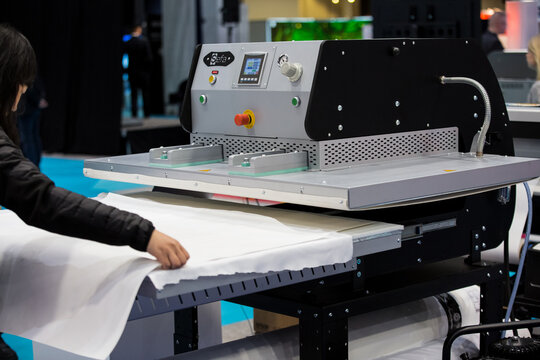 Helsinki, Finland - March 11, 2020: Big professional industrial printer Epson in action. Technology transfer images to the fabric. International fair Sign, Print, Pack at Messukeskus exhibition center