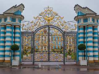 Golden Gate in the Catherine Palace, a Rococo palace in Tsarskoye Selo. Sightseeing in St....