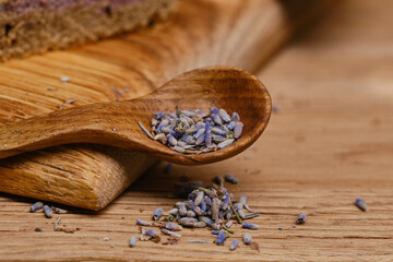 Wooden spoon with lavender. Shallow depth of field
