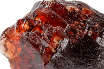 Macro mineral stone Garnet Spessartine on a white background