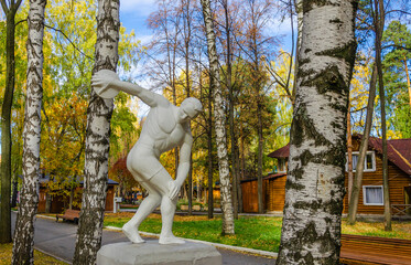 An ancient sculpture in the park.