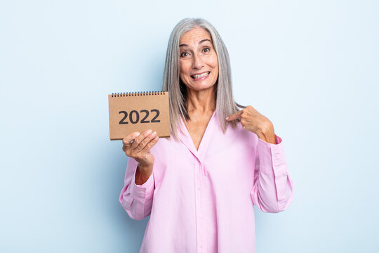 Middle Age Gray Hair Woman Feeling Happy And Pointing To Self With An Excited. 2022 Calendar Concept