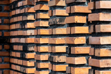 Old fence posts made of brown bricks. old city wall in Nakhon Si Thammarat