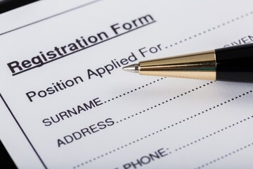 questionnaire form with a pen
