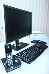Office Desk with Computer and Telephone