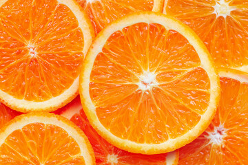 Background from fresh orange oranges. Healthy eating