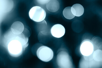 Blurred lights blue background. Abstract bokeh with soft light. Trendy color