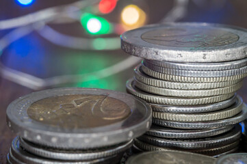 Coins close-up. Euro coins rubles. Money stacked.