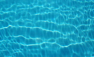 Ripple blue water in swimming pool