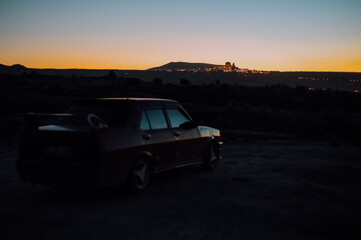 Fototapeta na wymiar car at sunset