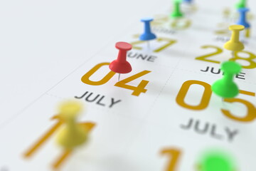 July 4 date and push pin on a calendar, 3D rendering