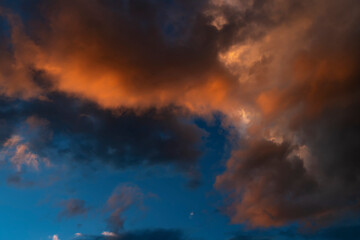 Fototapeta na wymiar Abstract of cloudscape beautiful evening sky orange clouds and blue sky