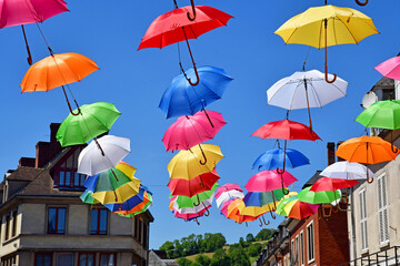 Fototapeta na wymiar Les Andelys; France - july 2 2019 : umbrellas in a street