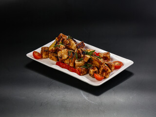 Roasted eggplant with vegetables and sauce