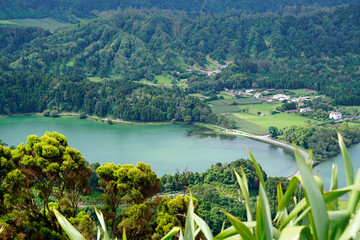 green and blue lake in cidade on the azores islands