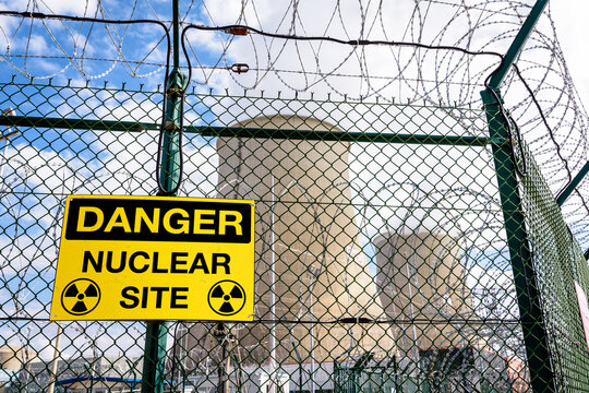 Danger warning sign on the security fence of a nuclear power station