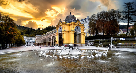 Colonnade with singing fountains in Marienbad at sunset -Marianske Lazne, Czech Republic - obrazy, fototapety, plakaty