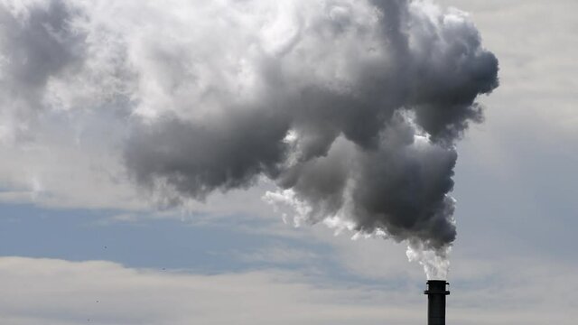 Air pollution with smoking chimney