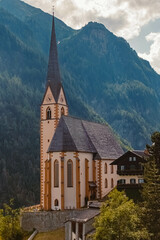 Beautiful alpine summer view with the church of Heiligenblut near the famous Grossglockner High Alpine Road, Salzburg, Kaernten, Austria