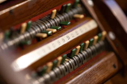 Green and yellowish knobs of an organ