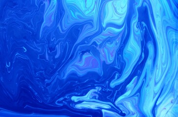 Abstract pink and blue marble background. The lines and waves of acrylic paint create an interesting structure. Background for web design, fabric, design, 