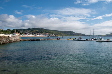 Boats in The Cobb harbour. Located in the seaside town Lyme Regis which is in west Dorset, southern England